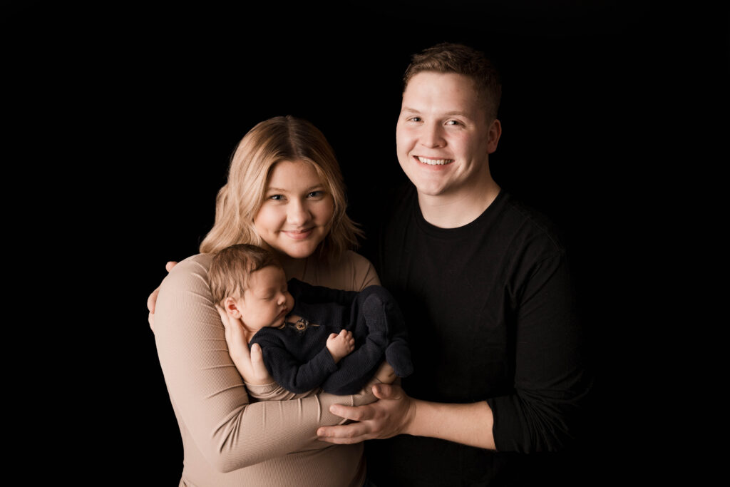 mom and dad in rio, wi newborn photography studio