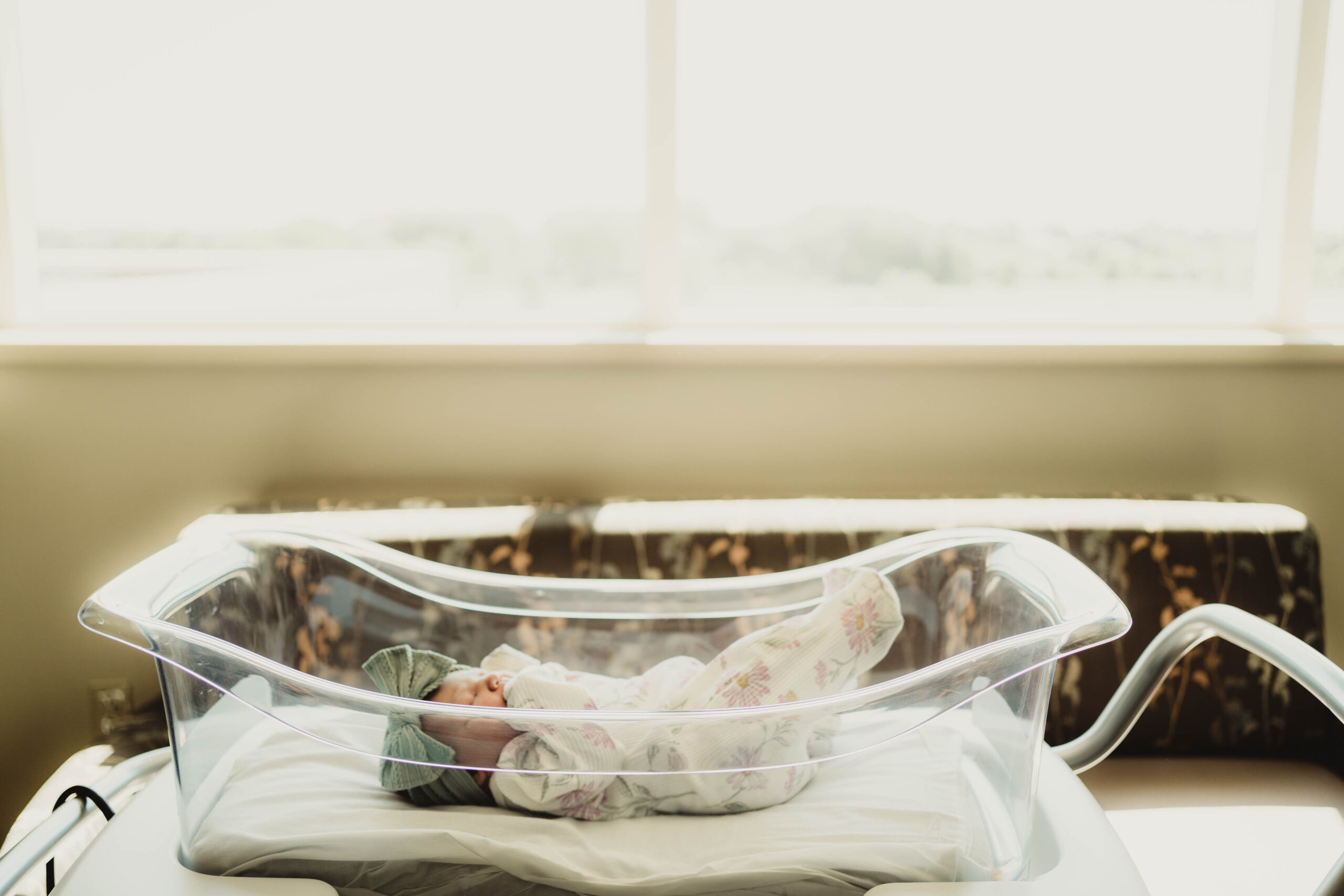 Newborn girl in hospital basinet during Fresh 48 session in Watertown, WI