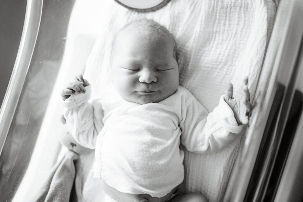 black and white photo of a newborn in an aurora medical center in wisconsin for a fresh 48 