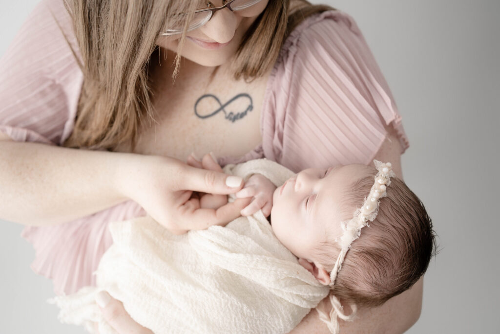 Timeless motherhood and newborn portrait in Rio, WI studio