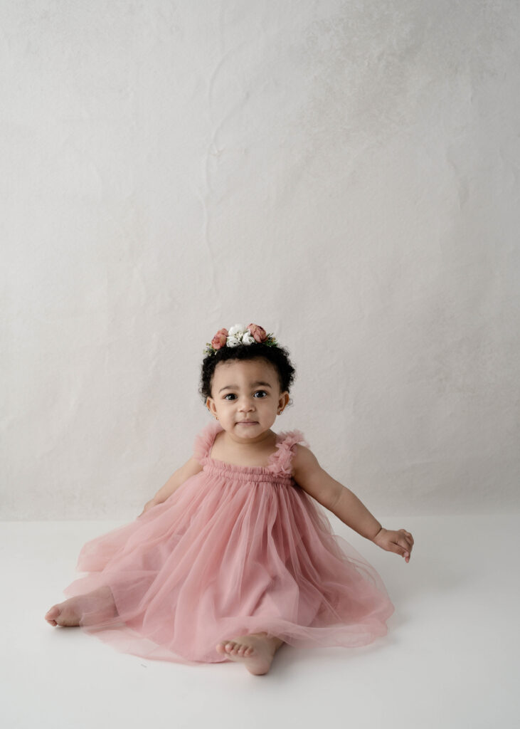     Rio WI cake smash photographer capturing milestone portraits