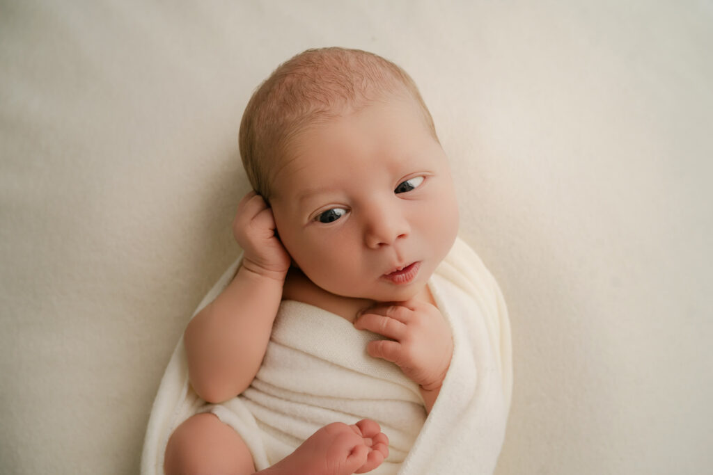 newborn awake - Newborn photography session near Madison, WI